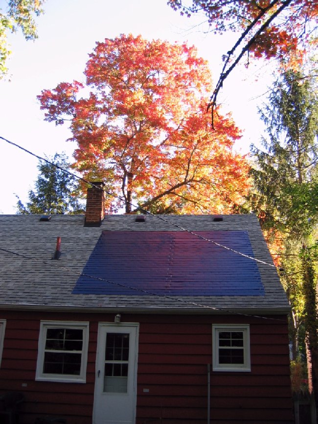 Small house with solar roofing shingles